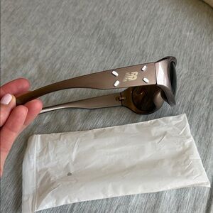 NEW, never worn..New Balance Bronze Sunglasses